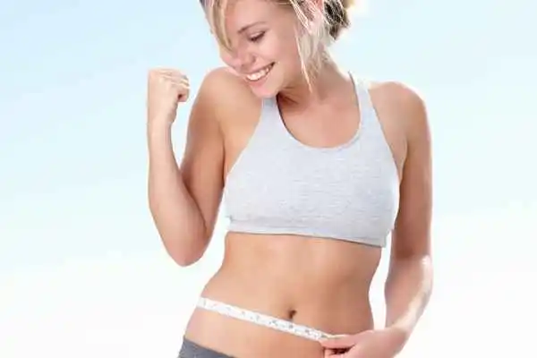 woman happy after fat reduction treatment Newmarket